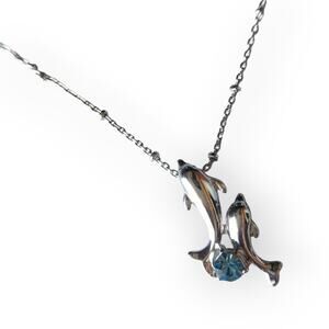 Dainty silver tone twin dolphin rhinestone accent pendant necklace
